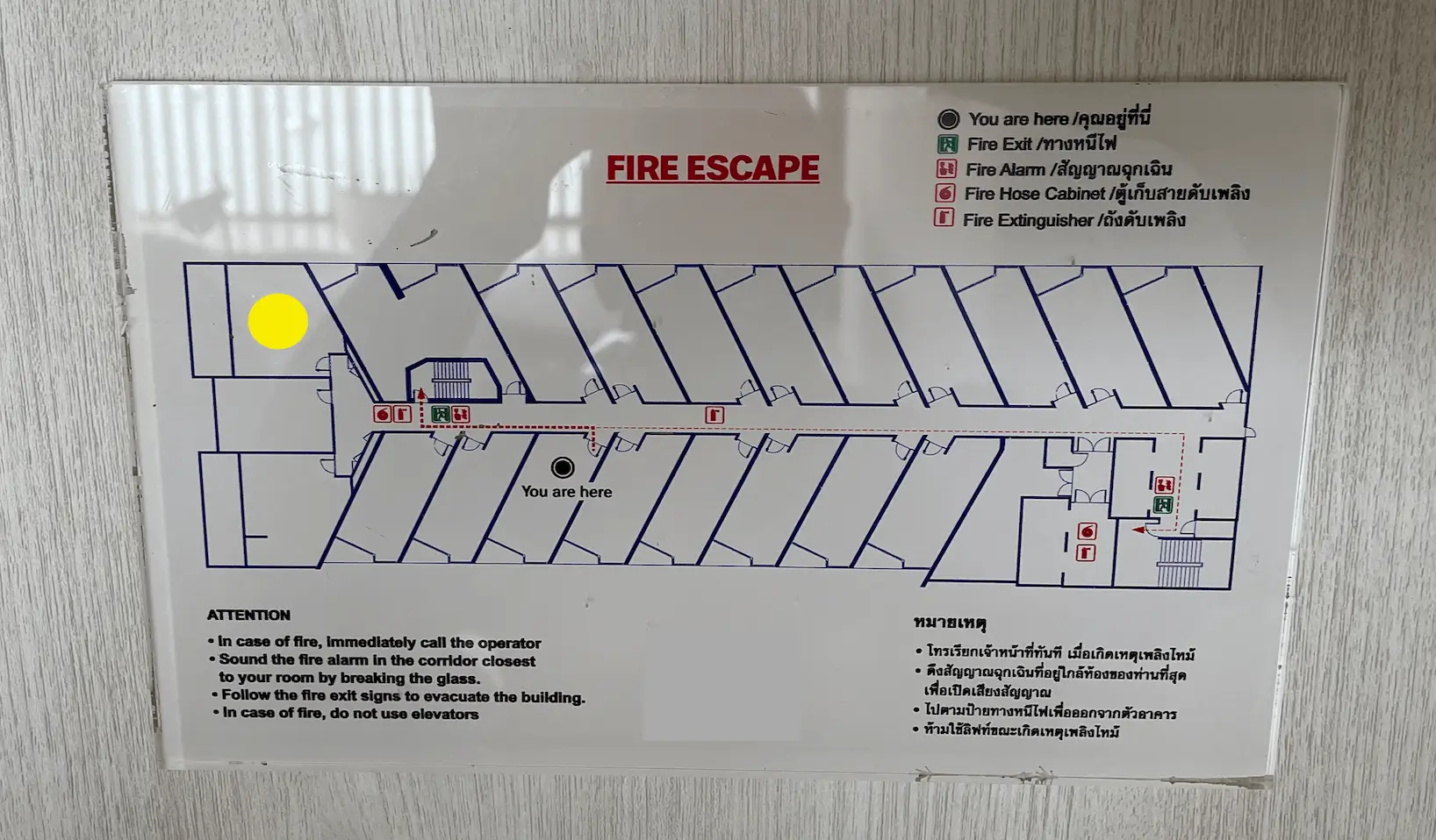 Hotel fire escape plan showing an unclear location marker