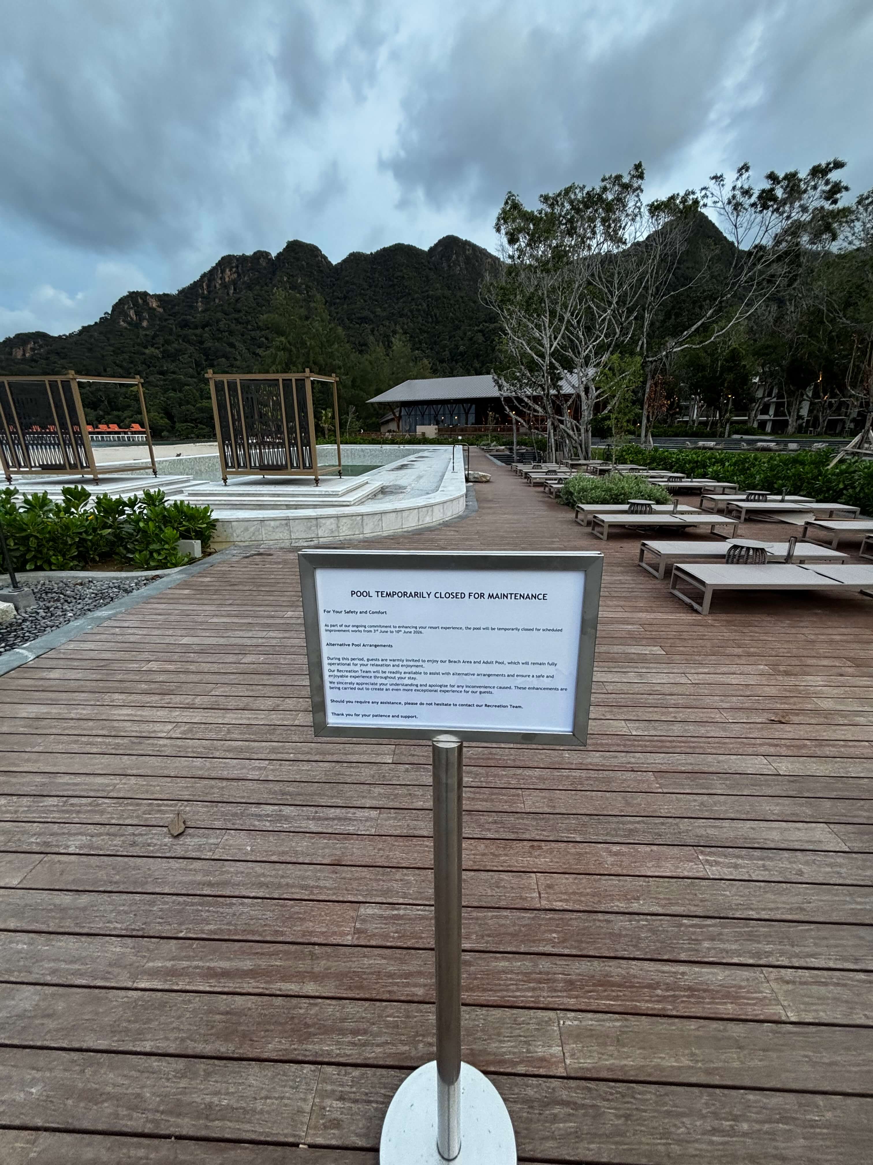 Closed and empty resort infinity pool